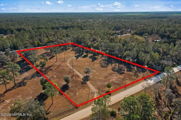 a view of a road with an ocean view