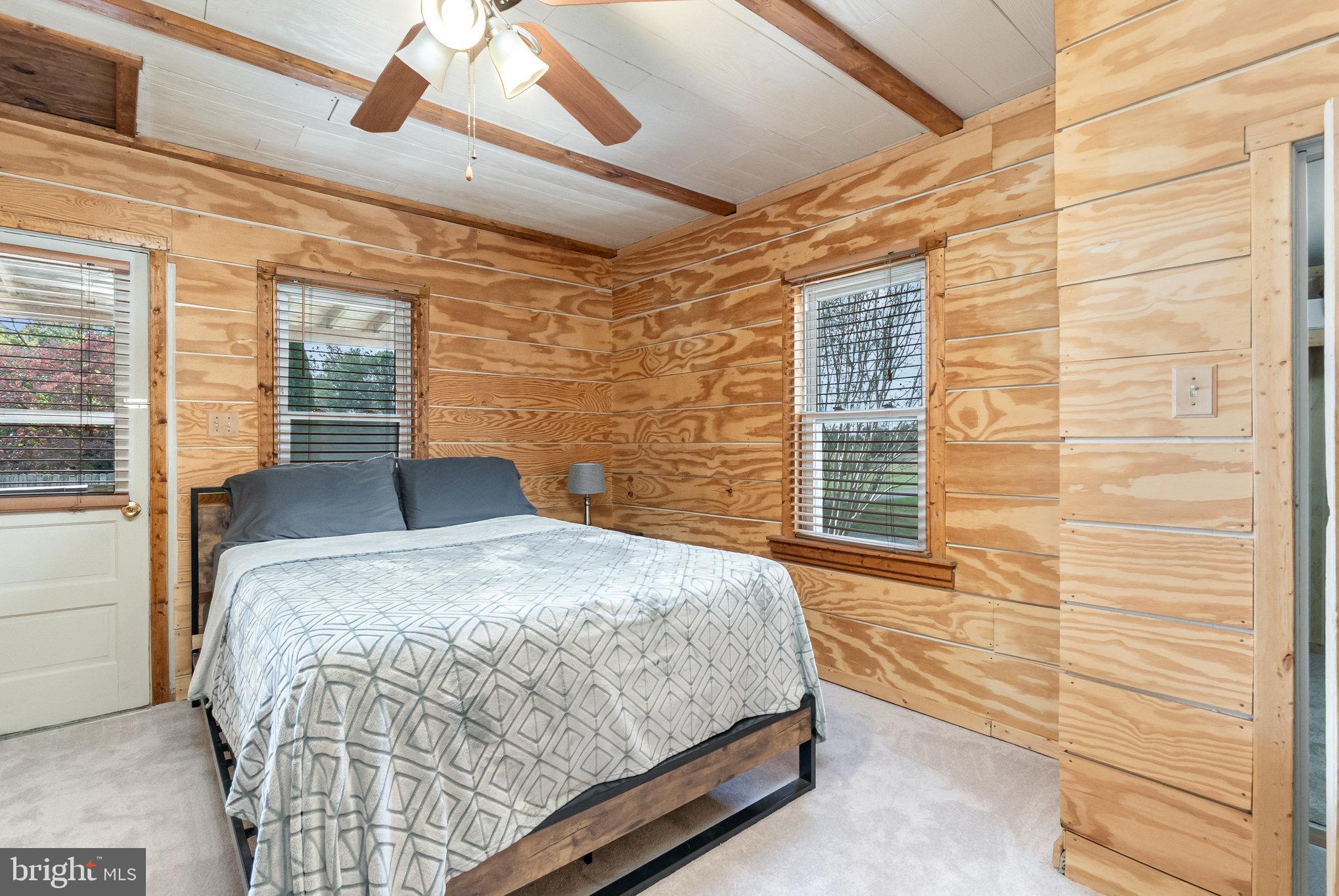 66 Spready Oak Road Rising Sun, MD 21911 - Photo 19 of 30 a bedroom with a bed and a window
