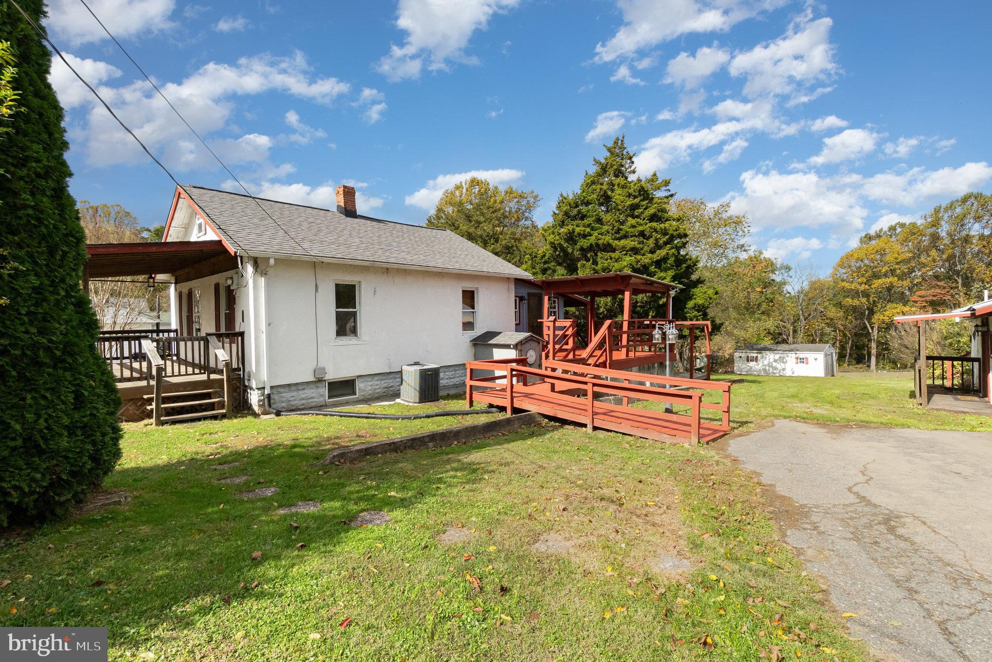 66 Spready Oak Road Rising Sun, MD 21911 - Photo 22 of 30 a view of a house with backyard porch and sitting area