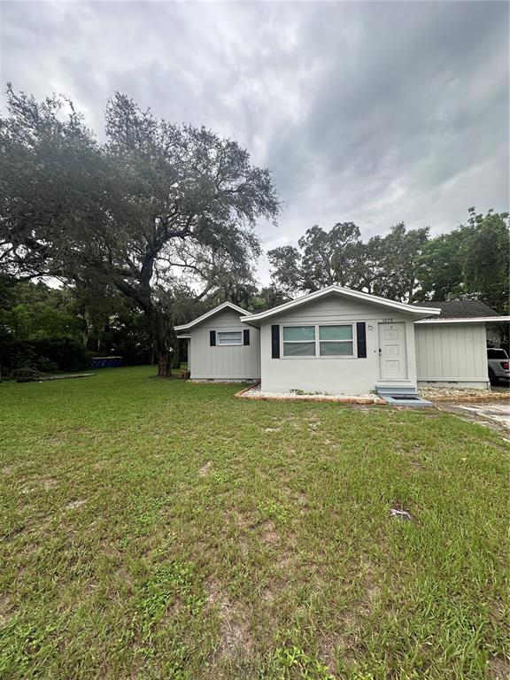 a house view with garden space