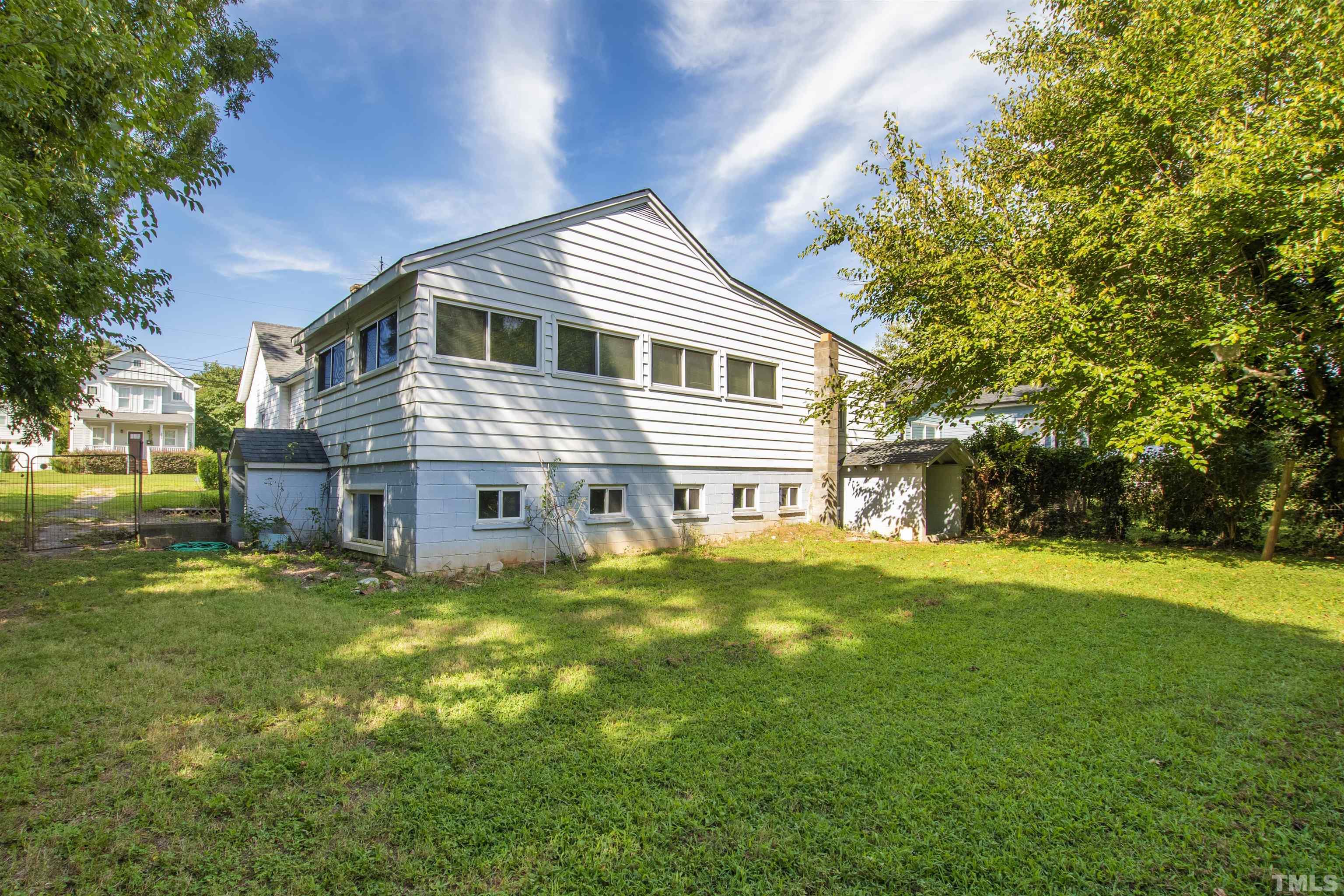 325 Maywood Avenue Raleigh, NC 27603 - Photo 26 of 30 a front view of house with yard and trees