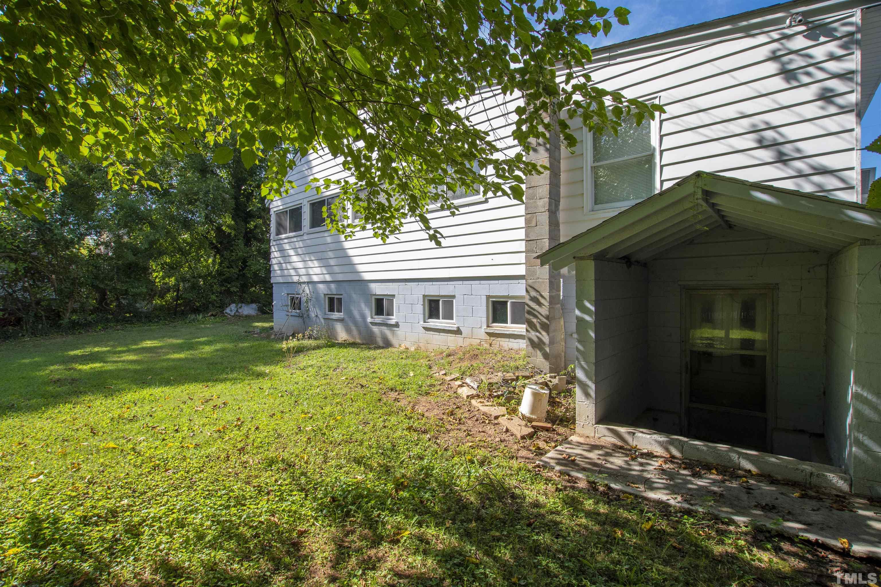 325 Maywood Avenue Raleigh, NC 27603 - Photo 29 of 30 a front view of a house with garden