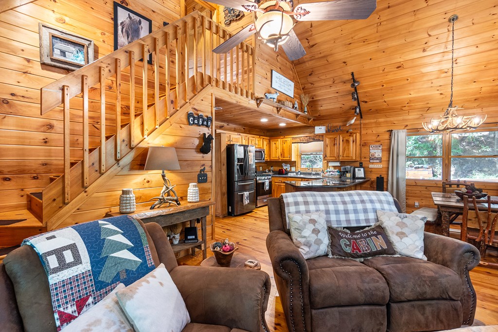 35 Wunder Bear Ridge Morganton, GA 30560 - Photo 13 of 76 a view of a living room filled with furniture and a couch