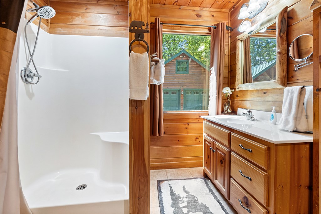 35 Wunder Bear Ridge Morganton, GA 30560 - Photo 24 of 76 a bathroom with a shower and a sink