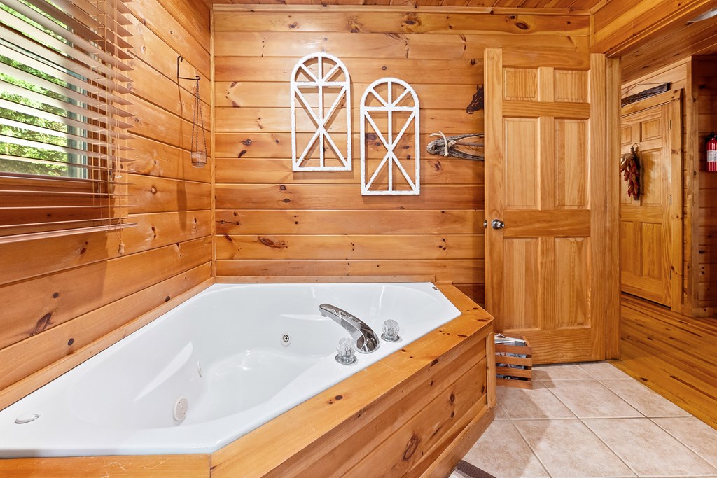 35 Wunder Bear Ridge Morganton, GA 30560 - Photo 25 of 76 a bathroom with a bathtub and shower