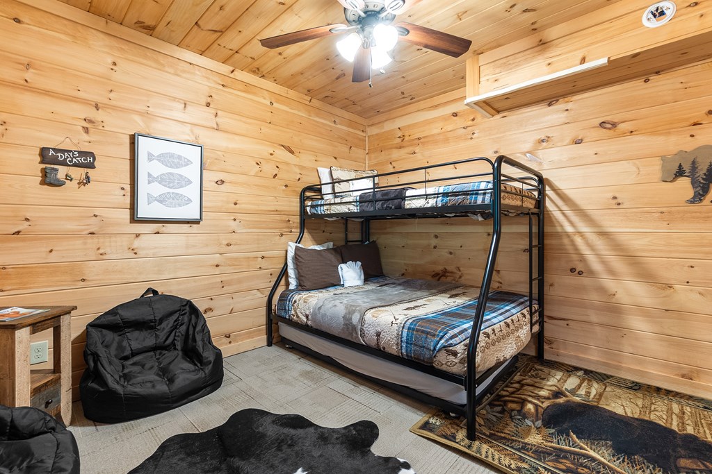 35 Wunder Bear Ridge Morganton, GA 30560 - Photo 33 of 76 a bedroom with a bed and a mirror