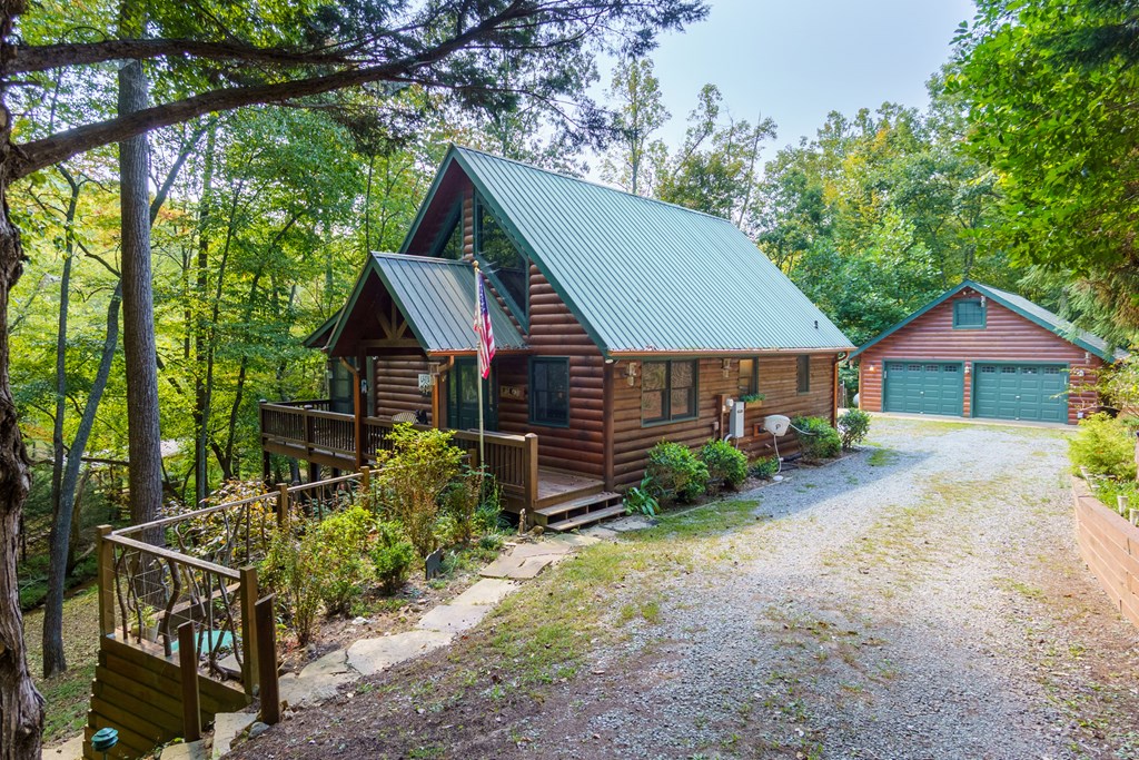35 Wunder Bear Ridge Morganton, GA 30560 - Photo 48 of 76 a front view of a house with garden