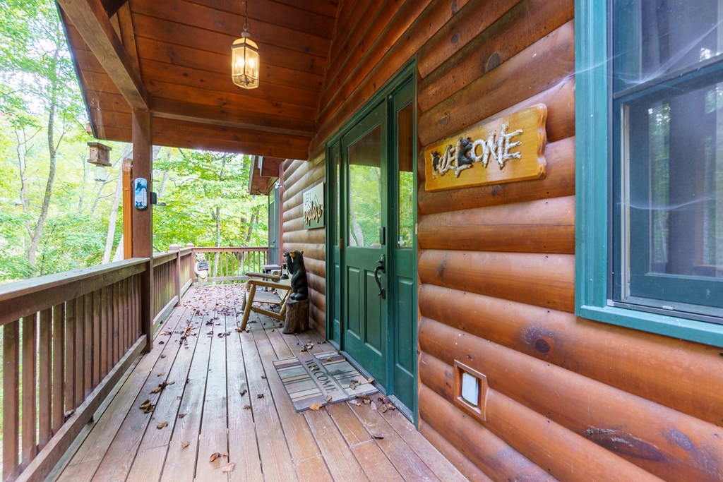 35 Wunder Bear Ridge Morganton, GA 30560 - Photo 6 of 76 a balcony with furniture and wooden floor