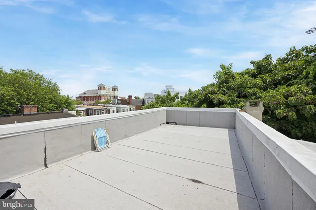 a terrace view with two chairs
