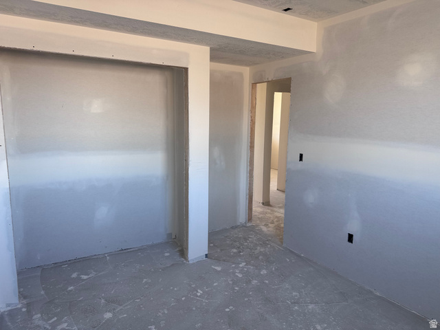 5777 West 4100 South Hooper, UT 84315 - Photo 34 of 41 Unfurnished bedroom with a closet