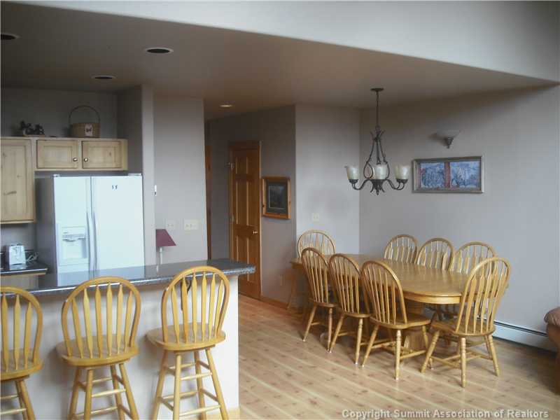 9062 Ryan Gulch Road, Unit B Silverthorne, CO 80498 - Photo 6 of 14 Dining Room. Plenty of seating for the holidays.