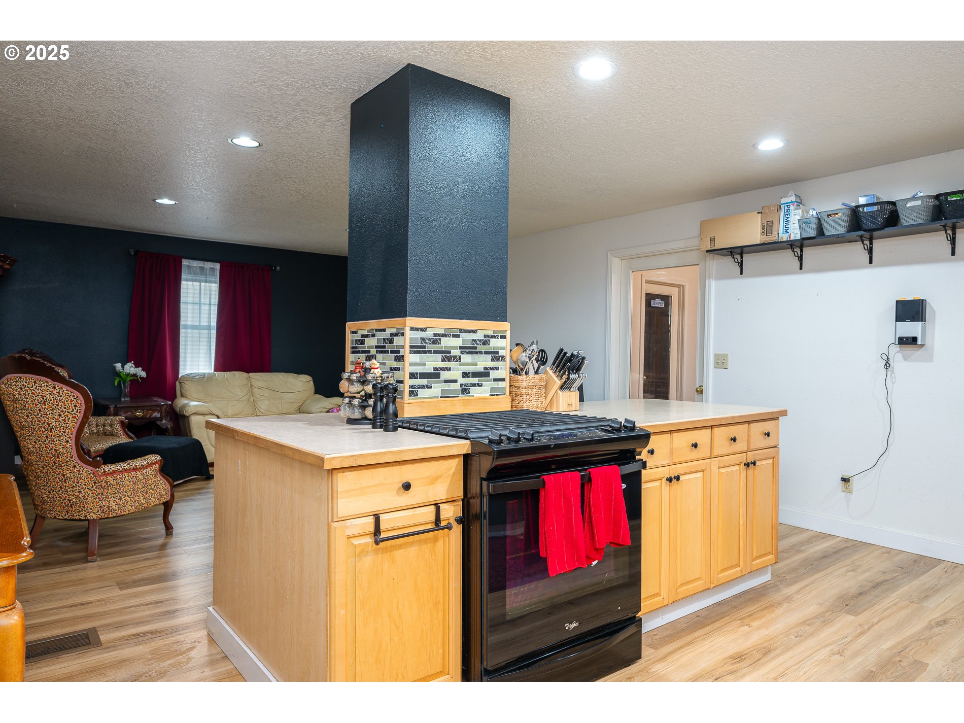 2837 Southeast 90th Place Portland, OR 97266 - Photo 15 of 40 a kitchen with stainless steel appliances granite countertop a stove and a refrigerator