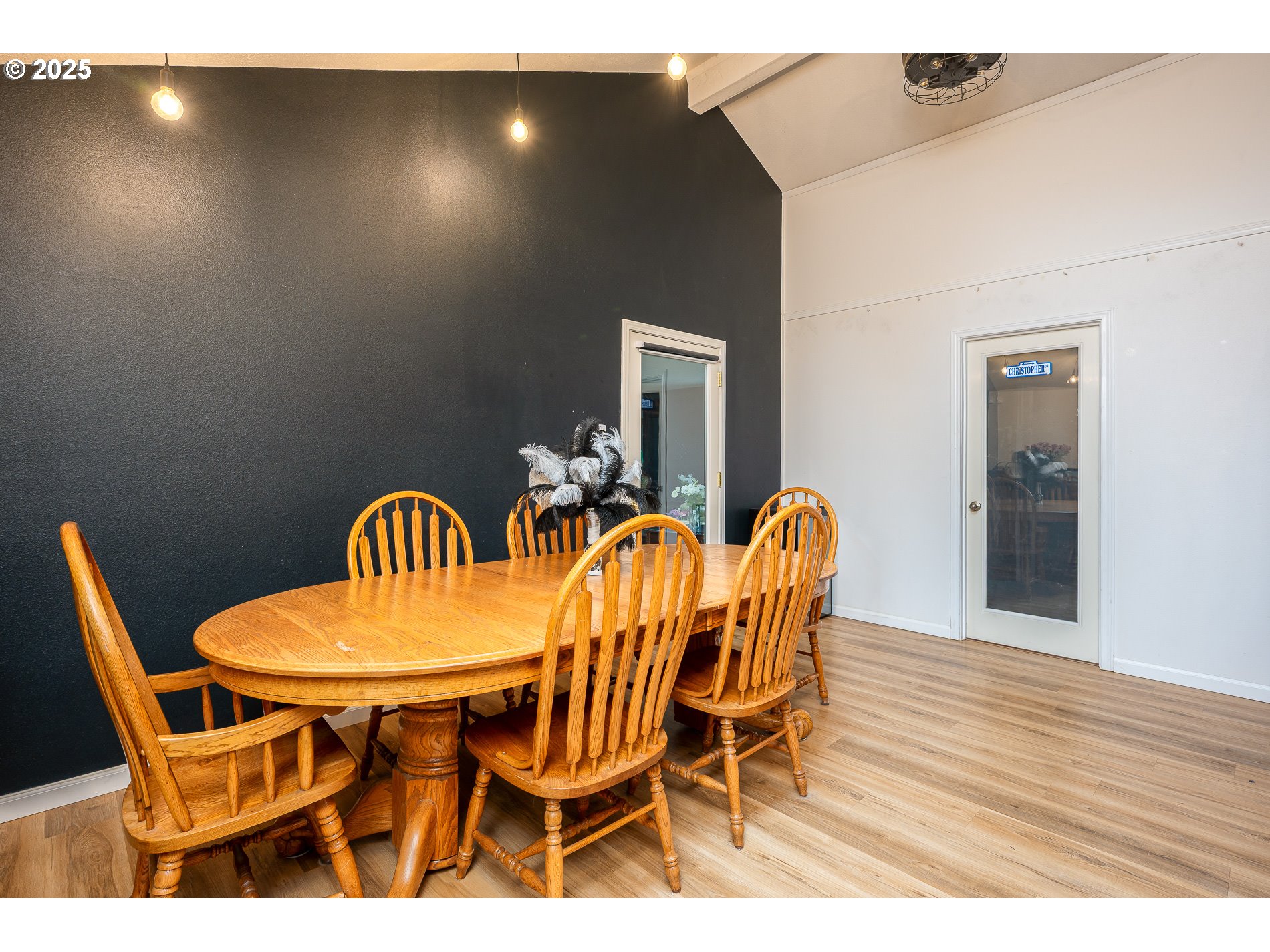 2837 Southeast 90th Place Portland, OR 97266 - Photo 5 of 40 a view of a dining room with furniture and wooden floor