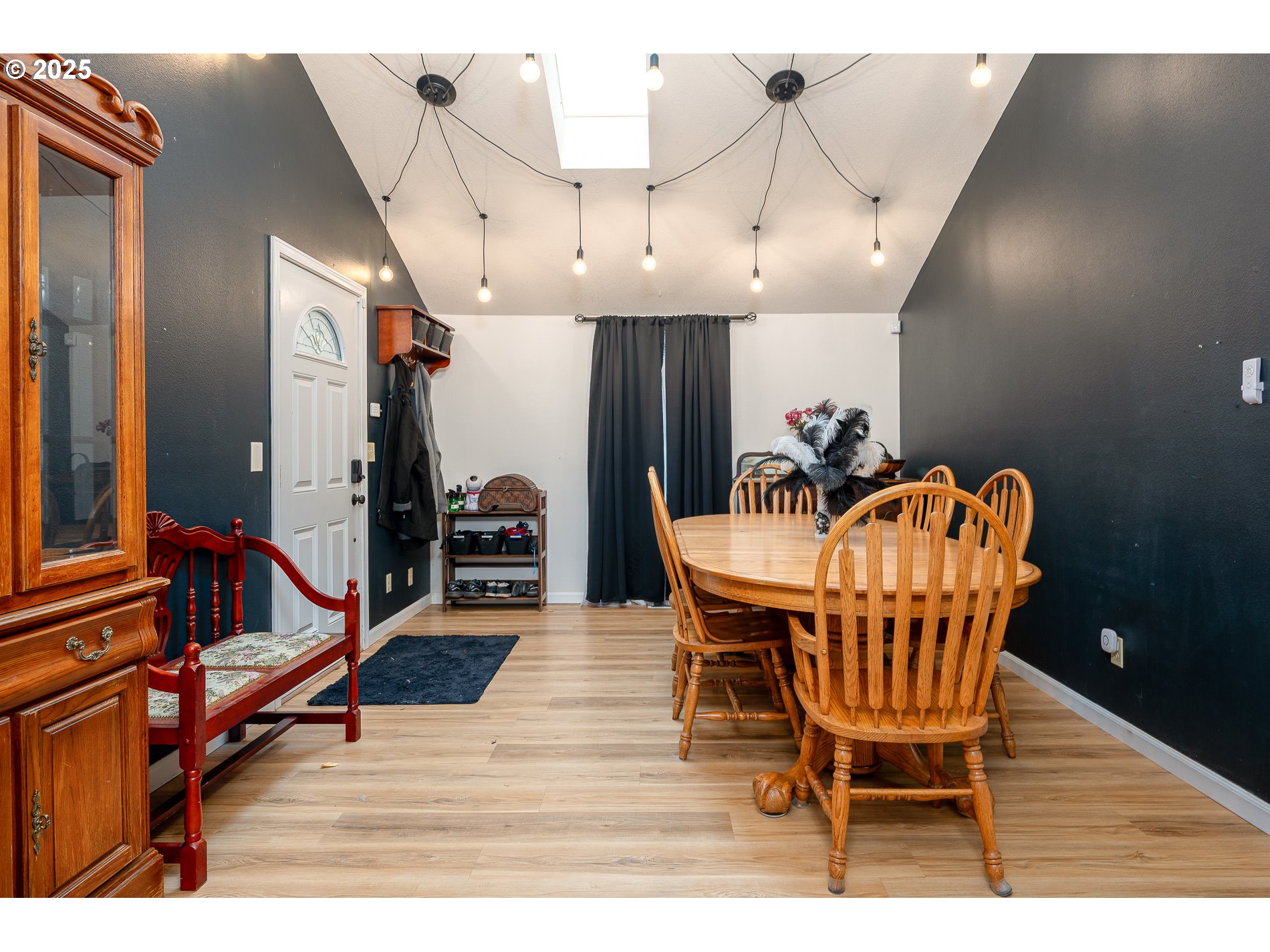 2837 Southeast 90th Place Portland, OR 97266 - Photo 6 of 40 a dining room with furniture and wooden floor