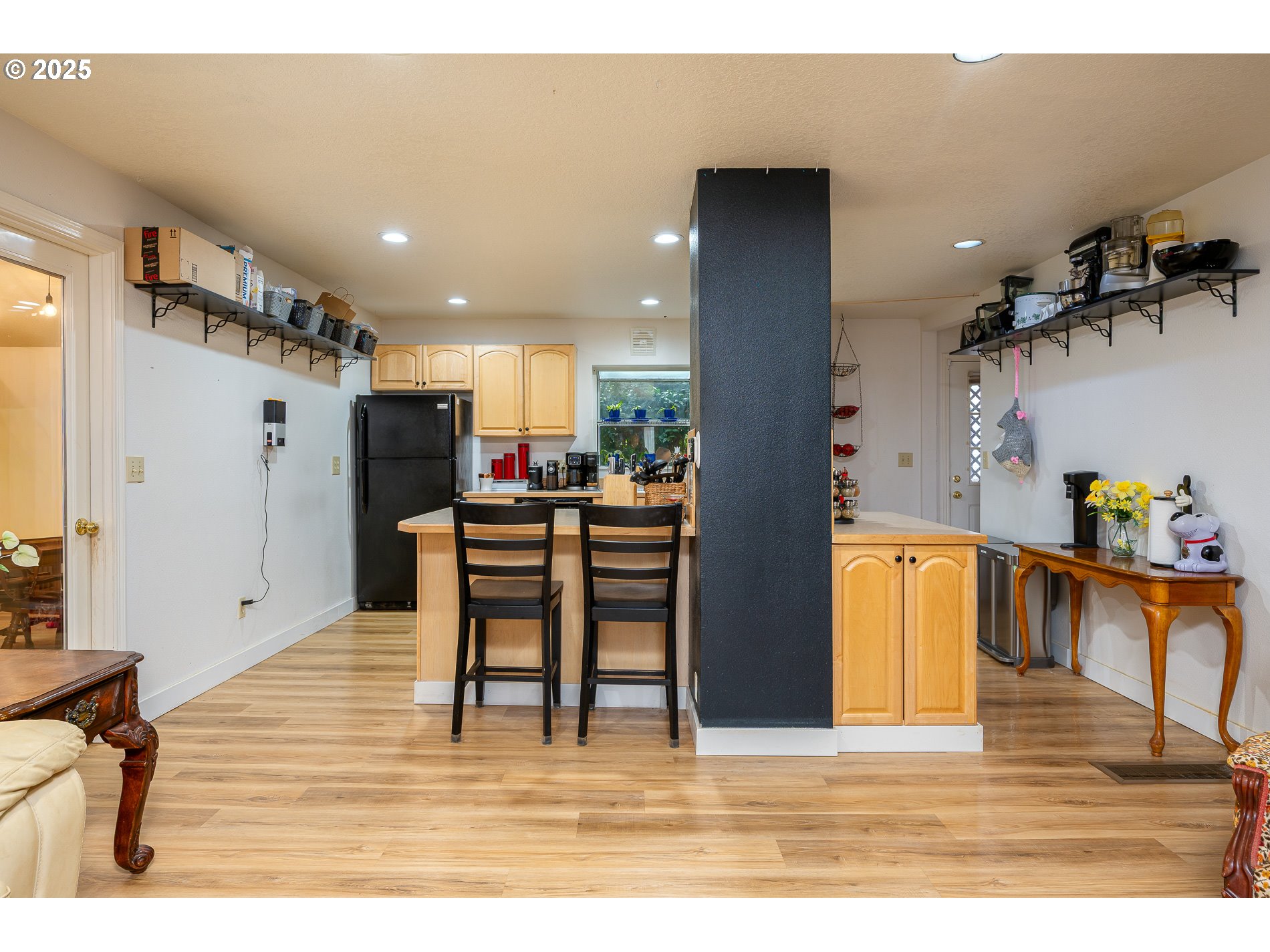 2837 Southeast 90th Place Portland, OR 97266 - Photo 10 of 40 a view of kitchen with furniture and a refrigerator