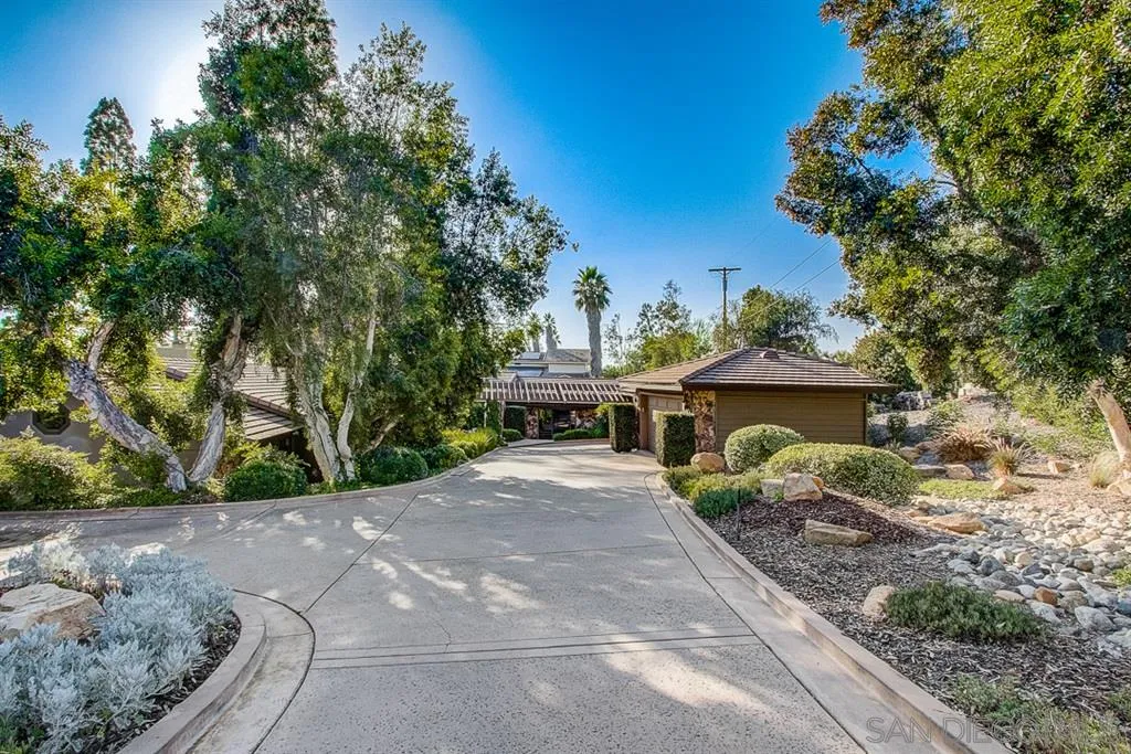 16508 Wilderness Road Poway, CA 92064 - Photo 1 of 25 a view of house with yard and a garage