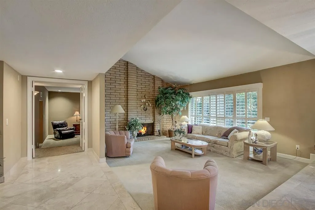 16508 Wilderness Road Poway, CA 92064 - Photo 16 of 25 a living room with furniture and a large window
