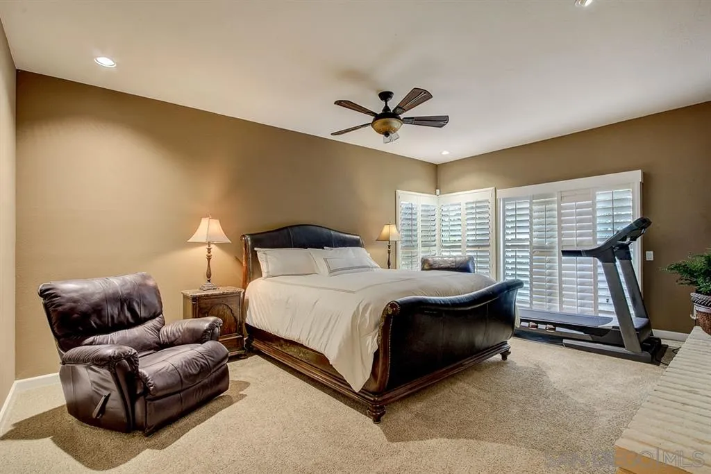16508 Wilderness Road Poway, CA 92064 - Photo 17 of 25 a bedroom with a bed couch and window