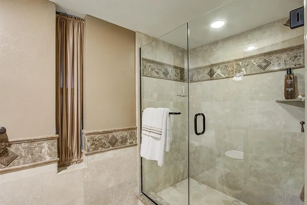 16508 Wilderness Road Poway, CA 92064 - Photo 19 of 25 a bathroom with a shower