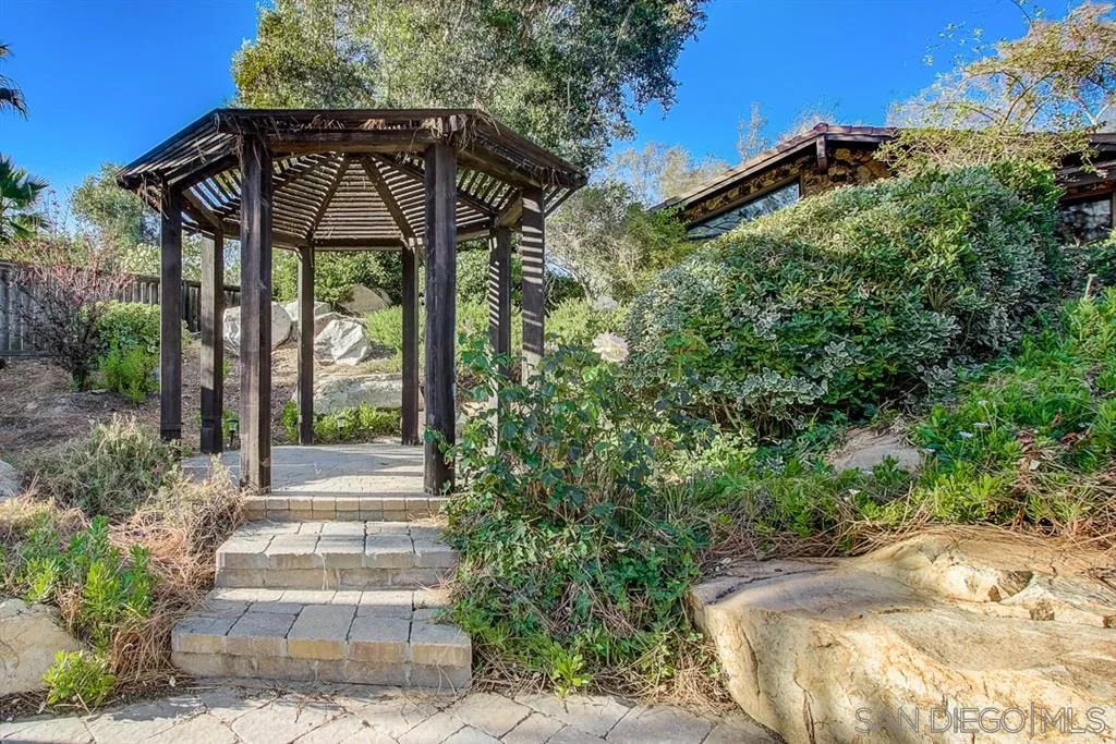 16508 Wilderness Road Poway, CA 92064 - Photo 25 of 25 a view of a front door and trees