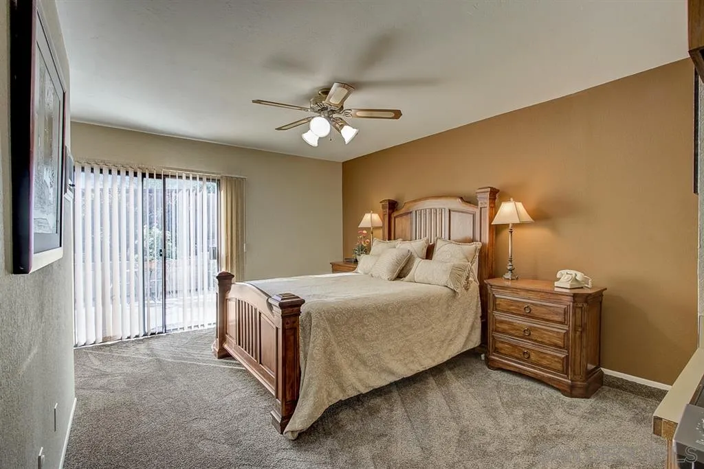 16508 Wilderness Road Poway, CA 92064 - Photo 8 of 25 a bedroom with a bed dresser and a window