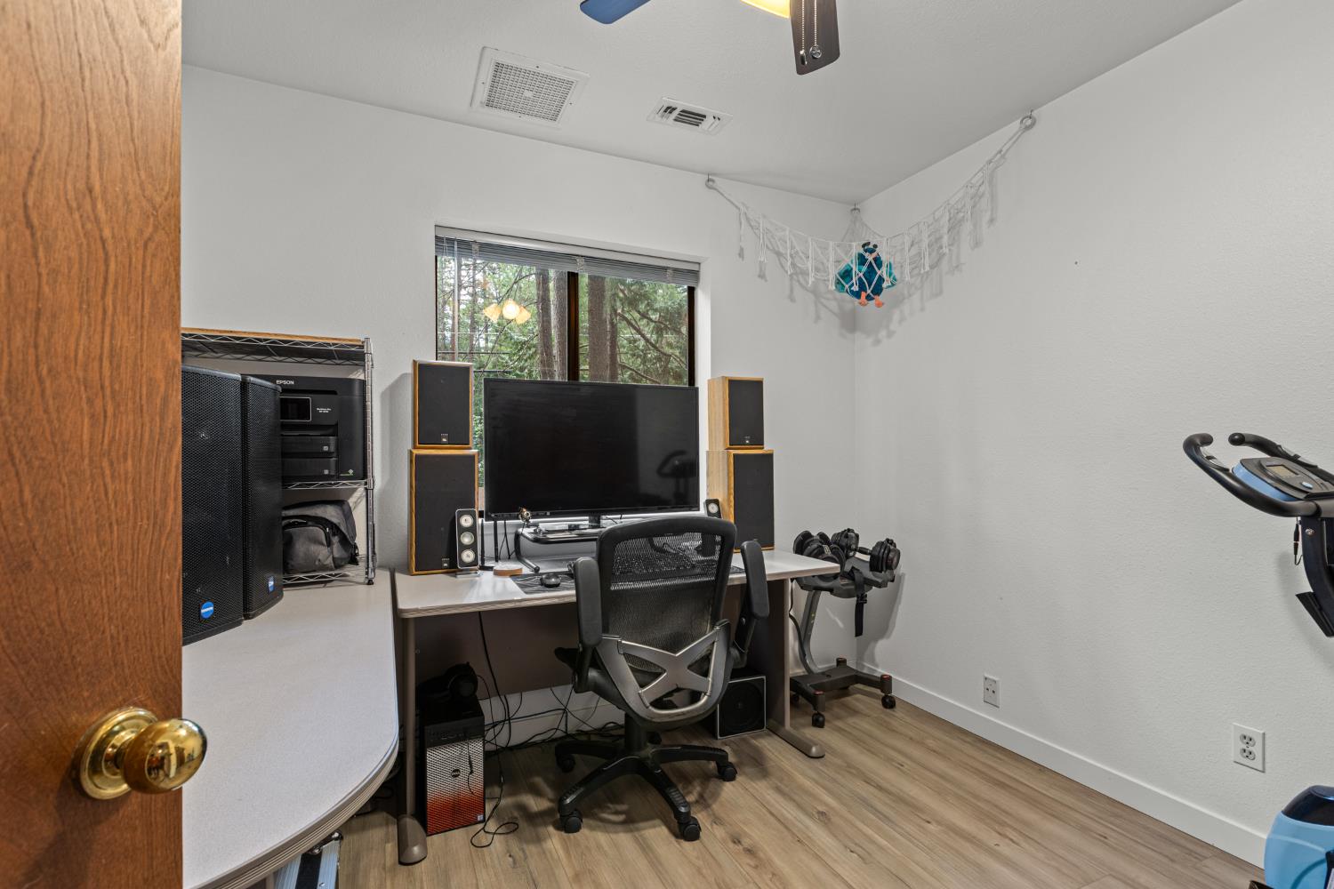 5680 Azalea Circle Pollock Pines, CA 95726 - Photo 12 of 31 a view of a workspace with furniture and wooden floor