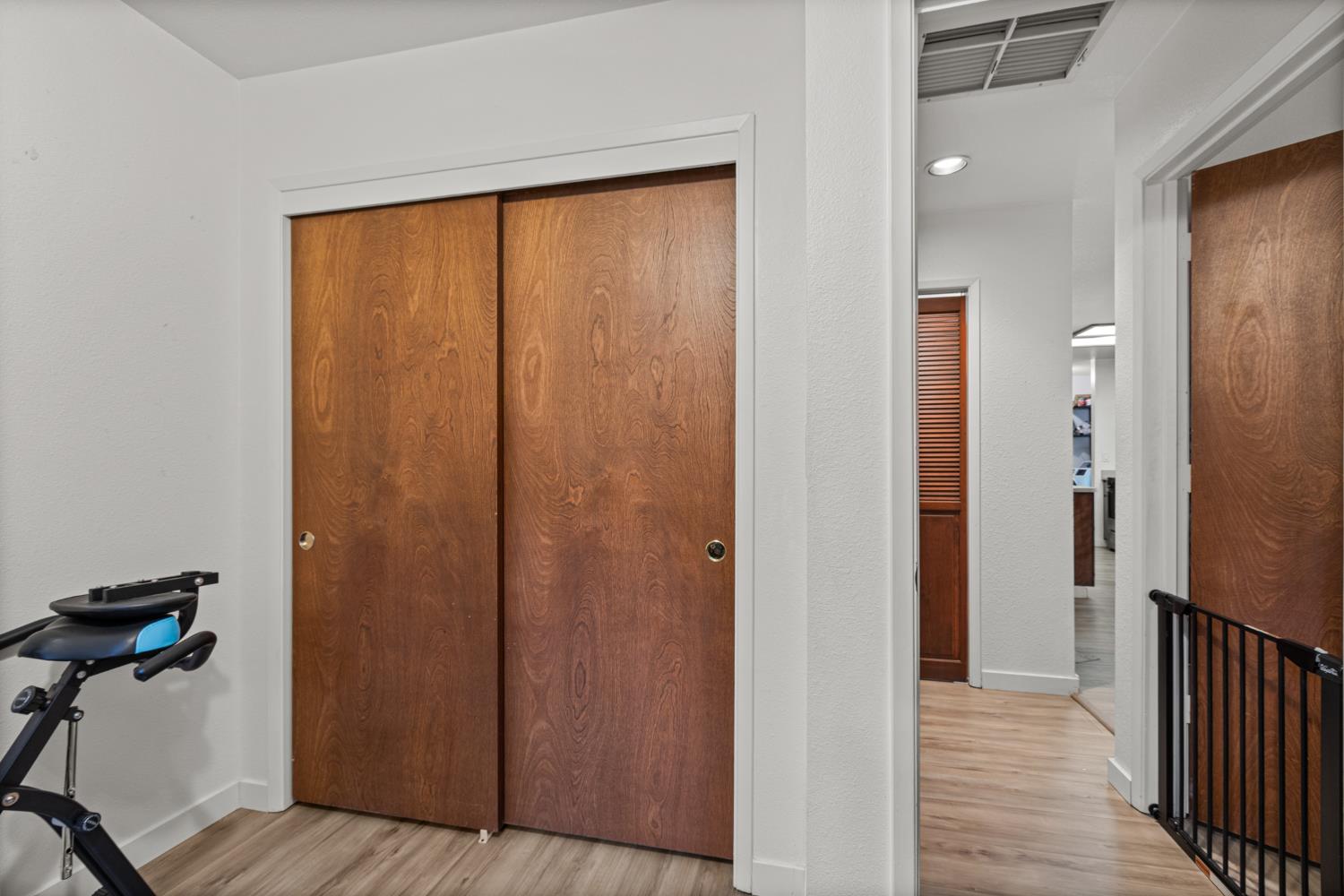 5680 Azalea Circle Pollock Pines, CA 95726 - Photo 14 of 31 a view of a room with wooden floor and a bathroom