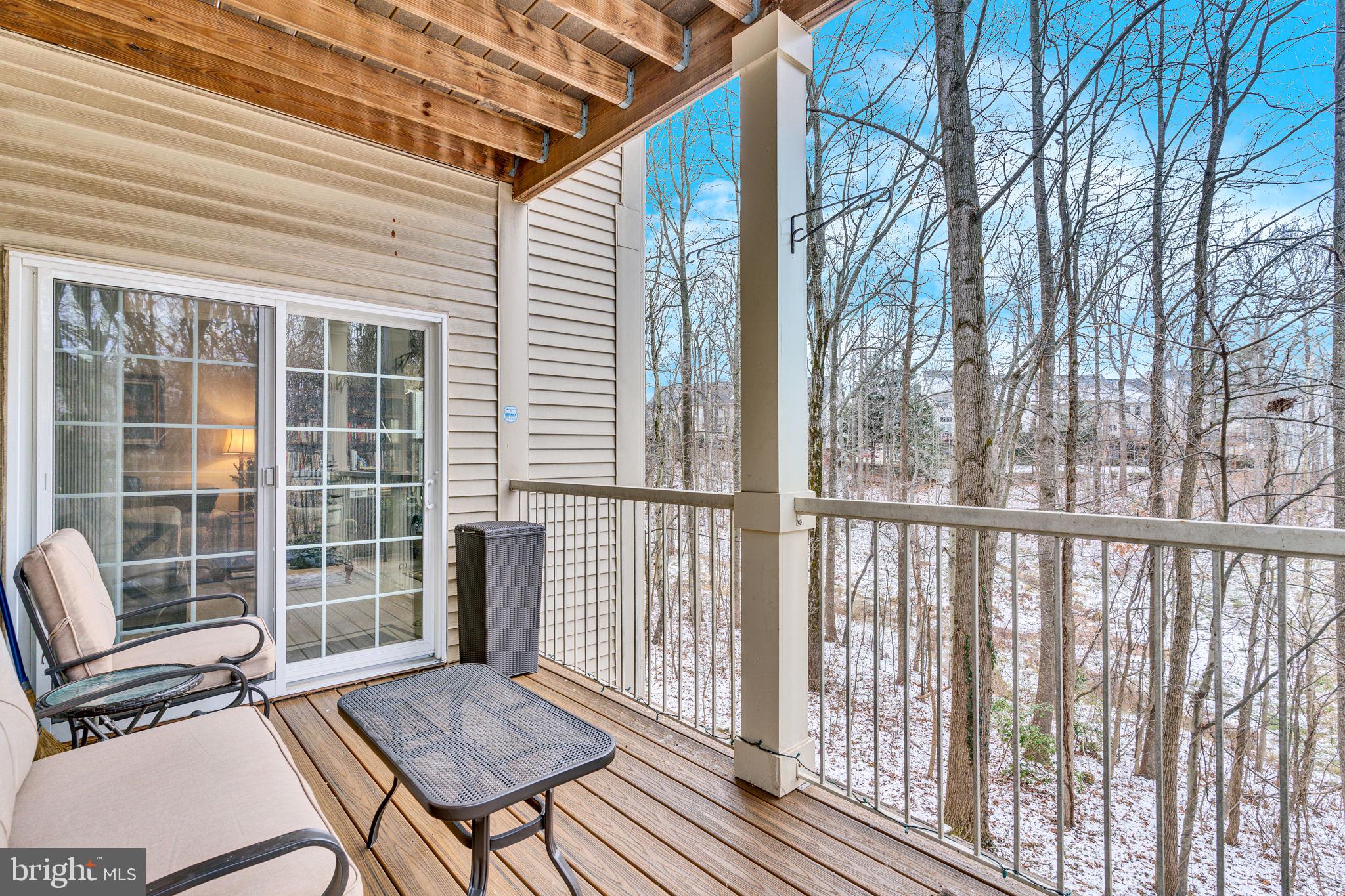 7706 Haynes Point Way, Unit 8F Alexandria, VA 22315 - Photo 29 of 36 a view of a two chairs in the balcony