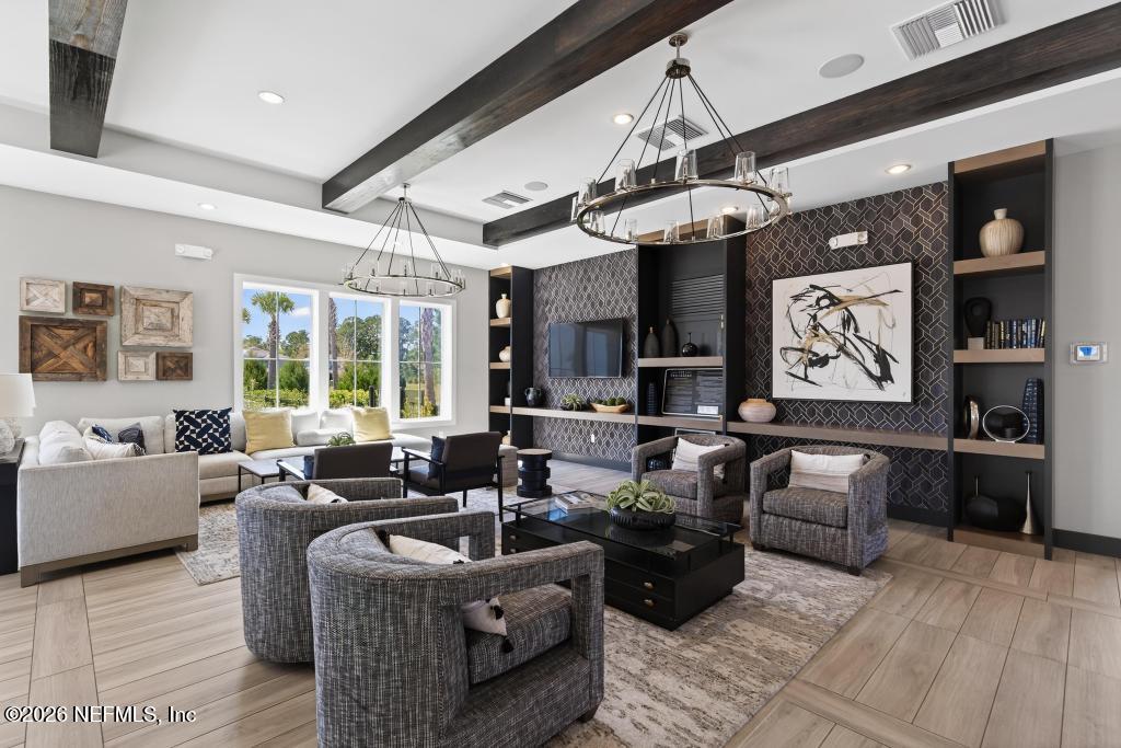 240 Ranch Land Circle St. Johns, FL 32259 - Photo 110 of 117 a living room with furniture and a large window