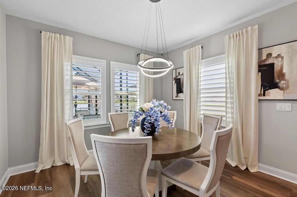 240 Ranch Land Circle St. Johns, FL 32259 - Photo 17 of 117 a dining room with furniture and window