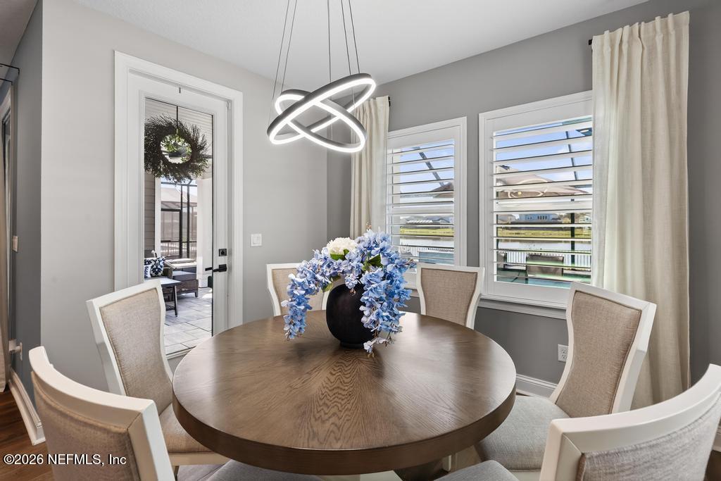 240 Ranch Land Circle St. Johns, FL 32259 - Photo 18 of 117 a view of a dining room with furniture and window