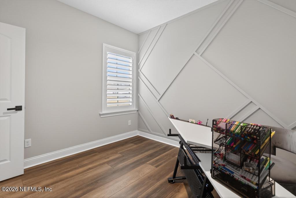 240 Ranch Land Circle St. Johns, FL 32259 - Photo 37 of 117 a view of a room with wooden floor table and chairs