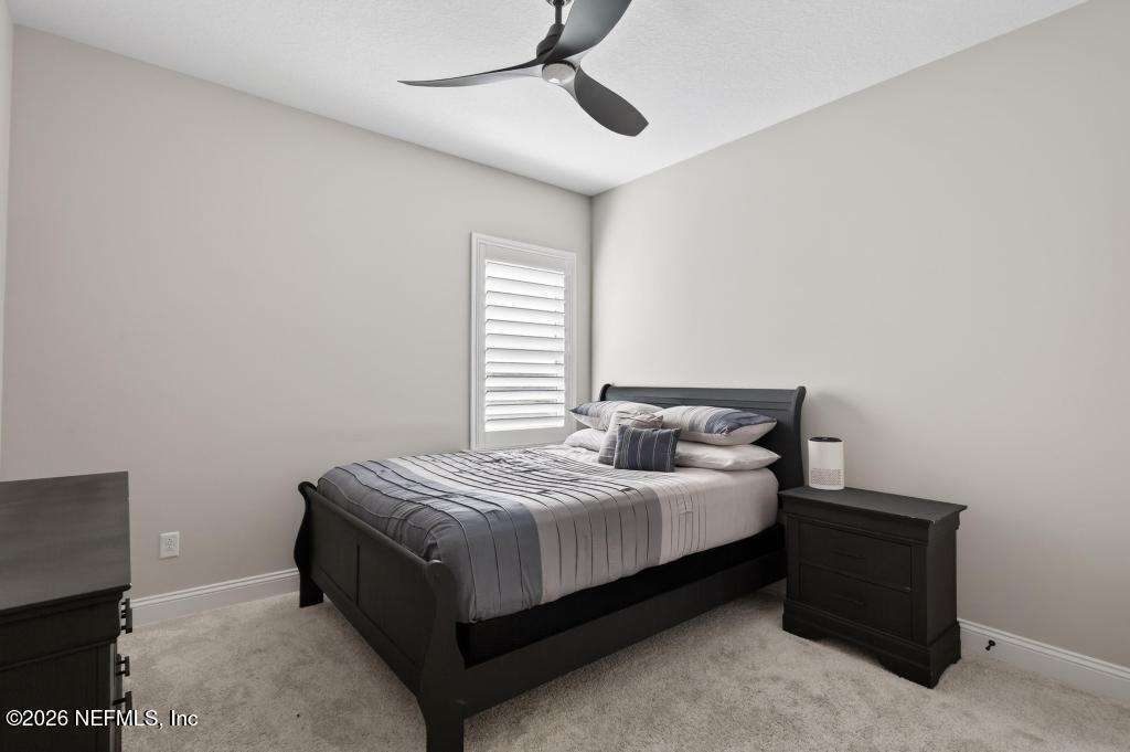 240 Ranch Land Circle St. Johns, FL 32259 - Photo 55 of 117 a a bedroom with a bed and window