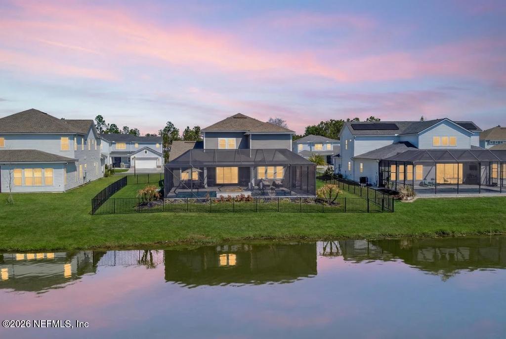 240 Ranch Land Circle St. Johns, FL 32259 - Photo 6 of 117 a front view of a house with a yard and garage