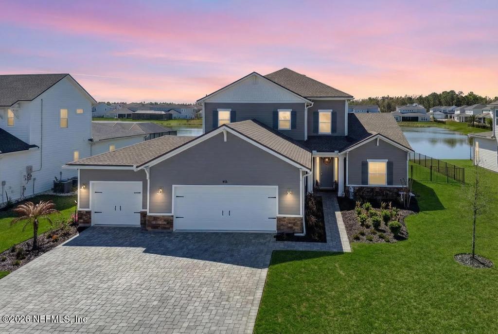 240 Ranch Land Circle St. Johns, FL 32259 - Photo 7 of 117 a front view of a house with a yard