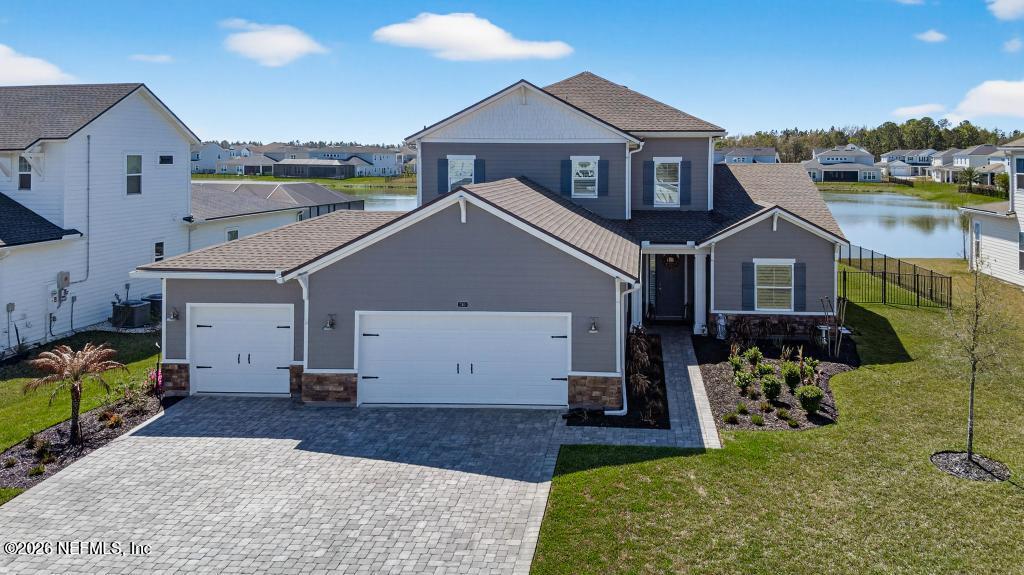240 Ranch Land Circle St. Johns, FL 32259 - Photo 71 of 117 a view of a house with a yard