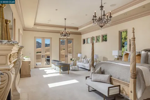 a spacious bathroom with a mirror a double vanity sink and a shower