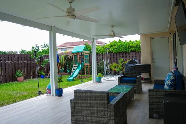 a house view with a sitting space and garden view