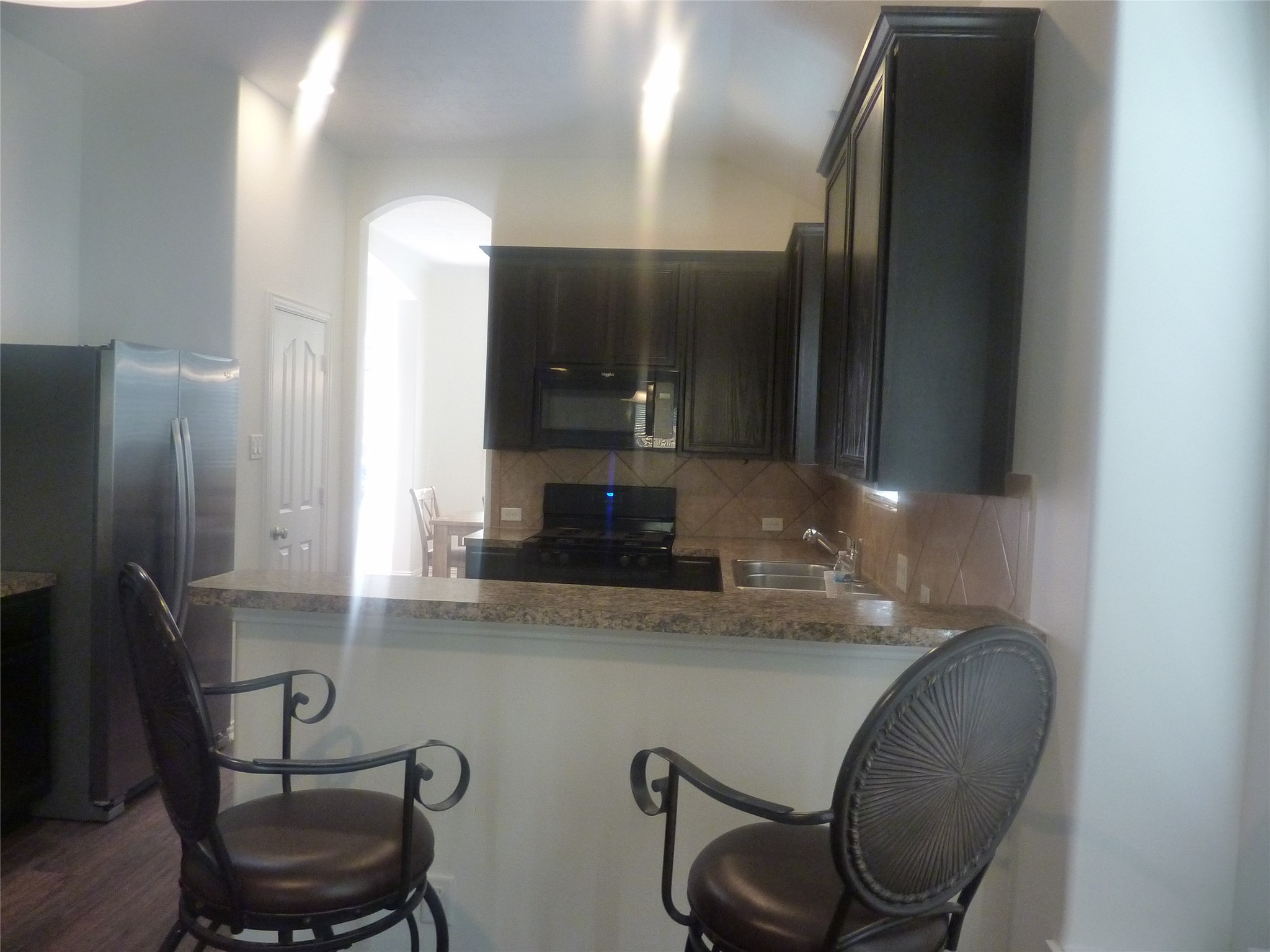 24038 Clipper Hill Lane Spring, TX 77373 - Photo 4 of 14 a bathroom with a sink and a mirror