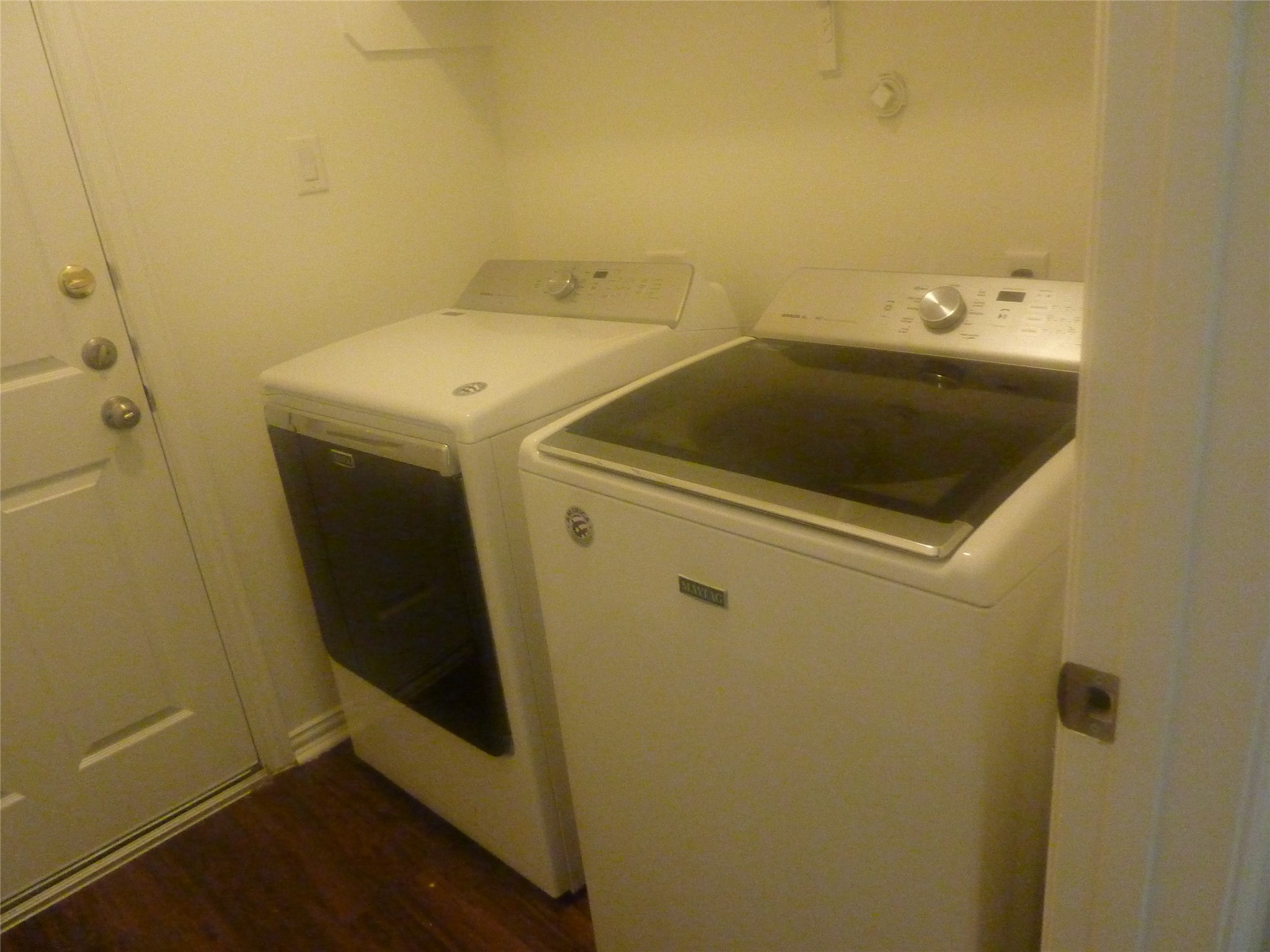 24038 Clipper Hill Lane Spring, TX 77373 - Photo 8 of 14 a utility room with dryer and washer