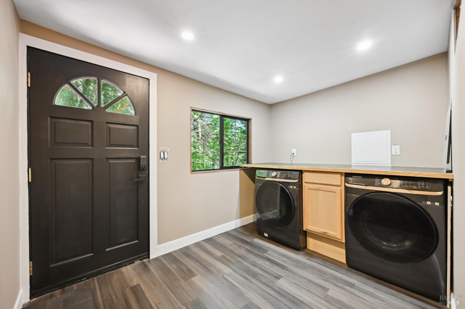 21713 Starrett Hill Drive Monte Rio, CA 95462 - Photo 38 of 50 a view of a kitchen with washer and dryer