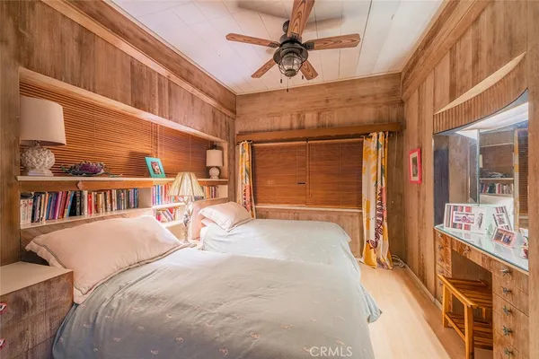a view of a bedroom with furniture and staircase