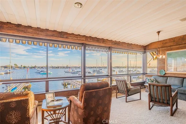 a view of a city from a dining room with furniture window and outside view