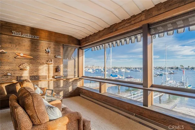 a view of a balcony with chairs