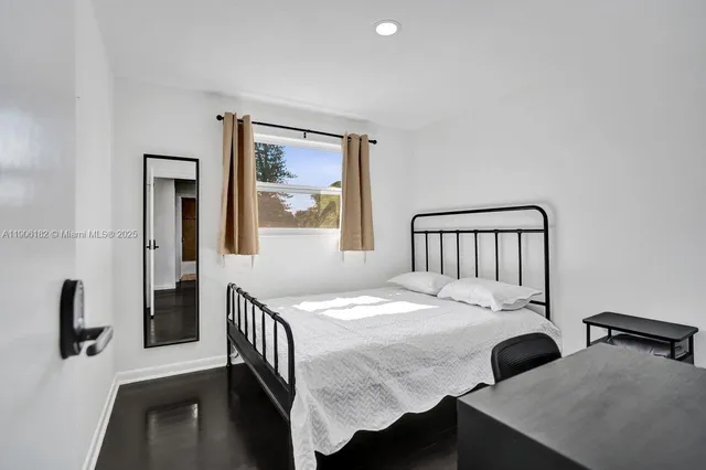 a house with swimming pool in front of it