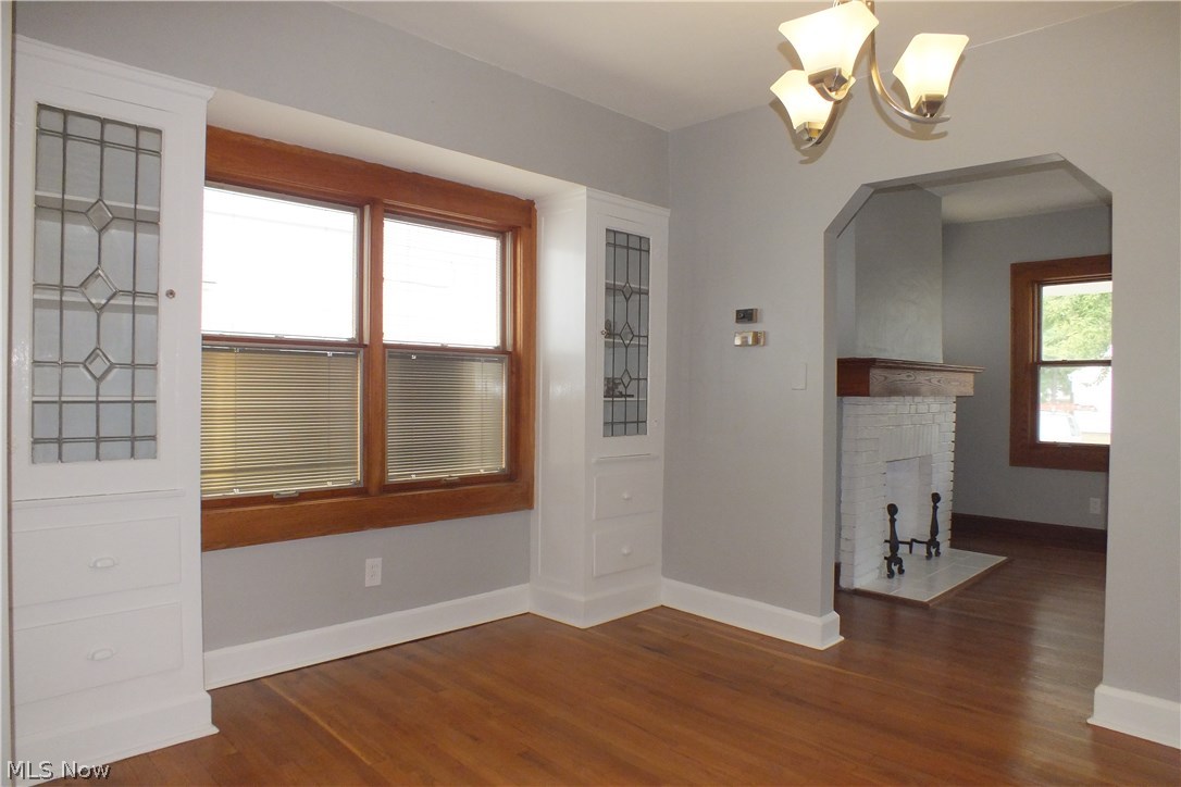 22651 Seabrooke Avenue Euclid, OH 44123 - Photo 11 of 31 Beautiful leaded-glass twin display cabinets complete this wonderful dining room