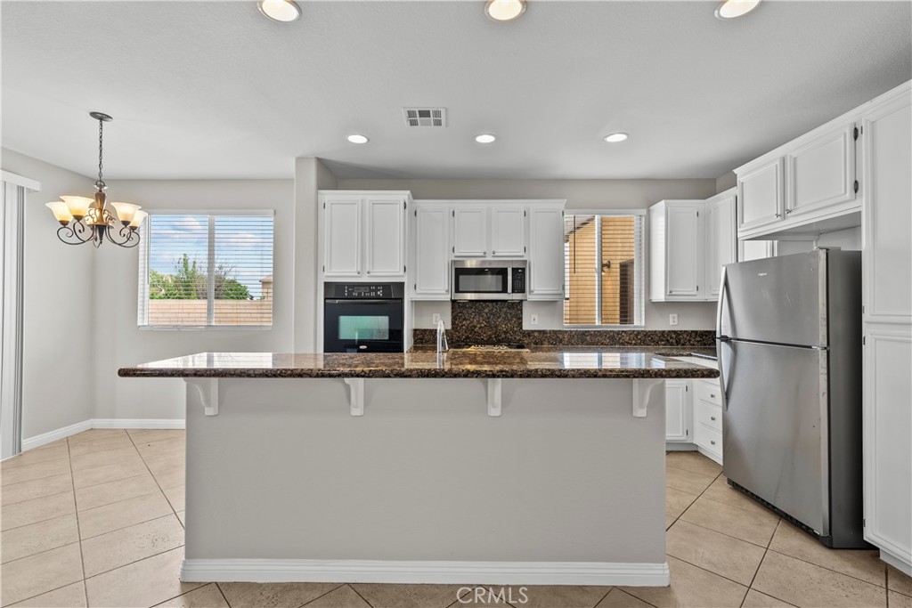 5741 Spice Street Lancaster, CA 93536 - Photo 18 of 44 Kitchen Island