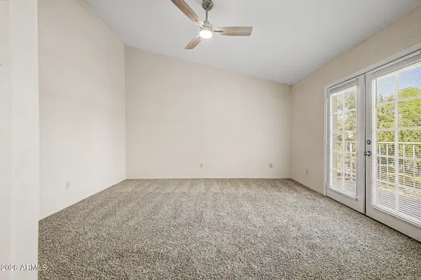 an empty room with windows