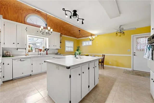 a spacious bathroom with a sink double vanity and a mirror