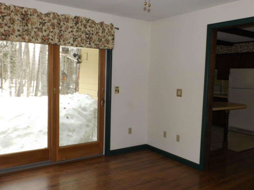 234 Kidder Hill Road Holden, ME 04429 - Photo 9 of 35 Optional dining room has sliding...
